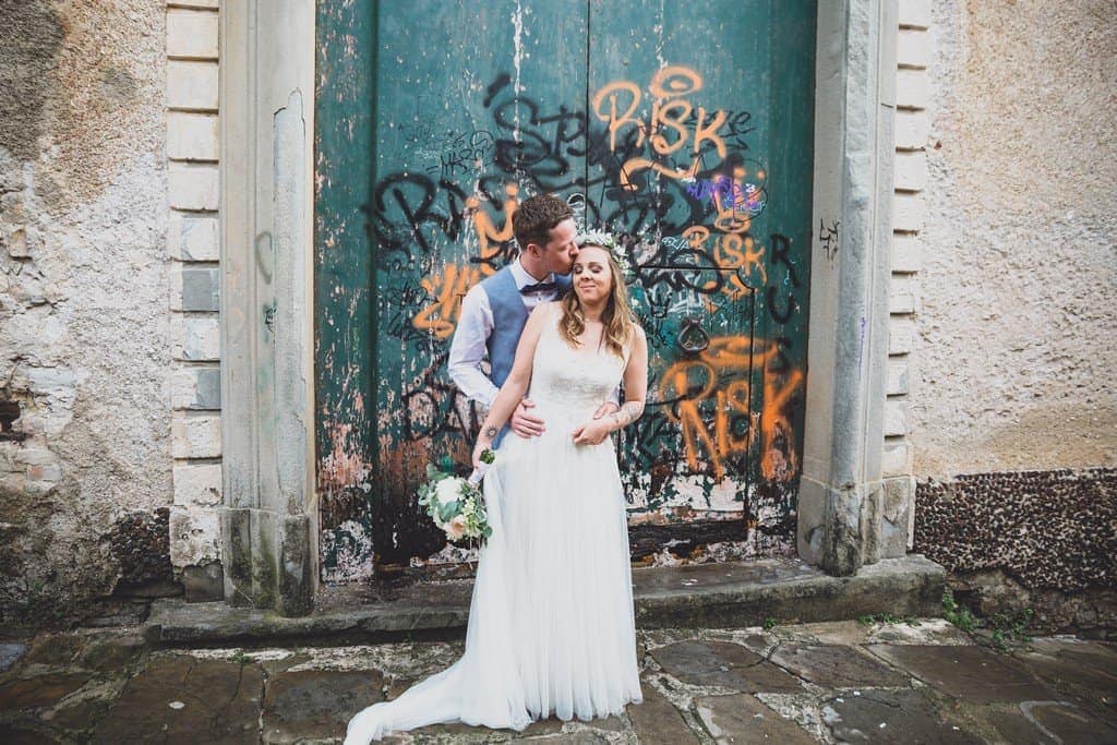 italy wedding photographer bride boho and blue suit relaxe