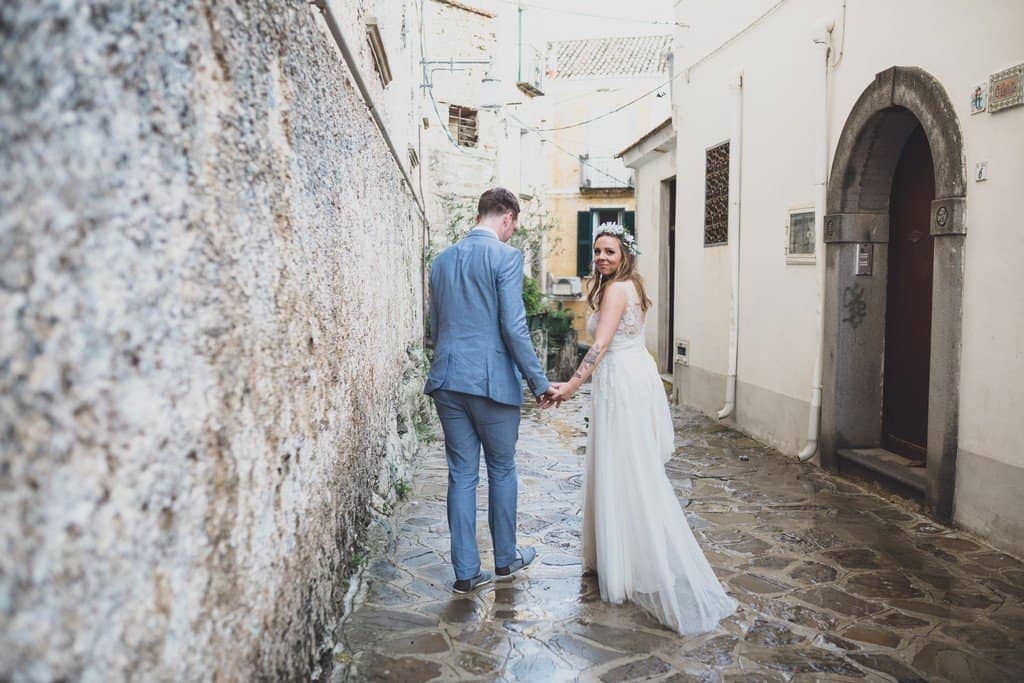 italy wedding photographer bride boho and blue suit relaxed