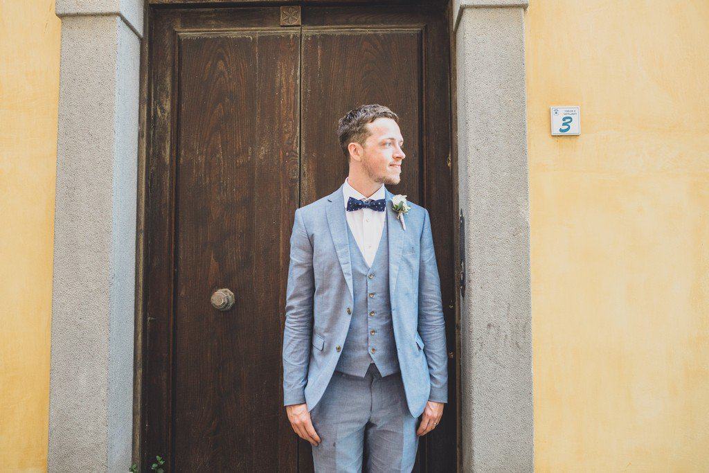 italy wedding photographer bride boho and blue suit relaxed