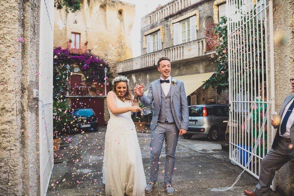 italy wedding photographer bride boho and blue suit relaxe