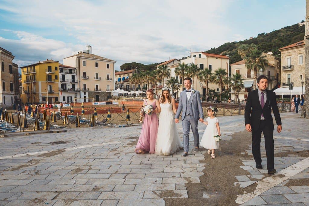 italy wedding photographer bride boho and blue suit relaxe