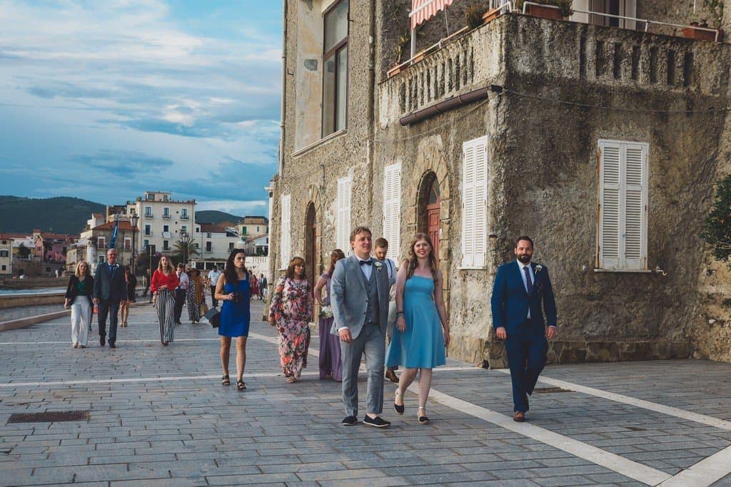 italy wedding photographer bride boho and blue suit relaxe