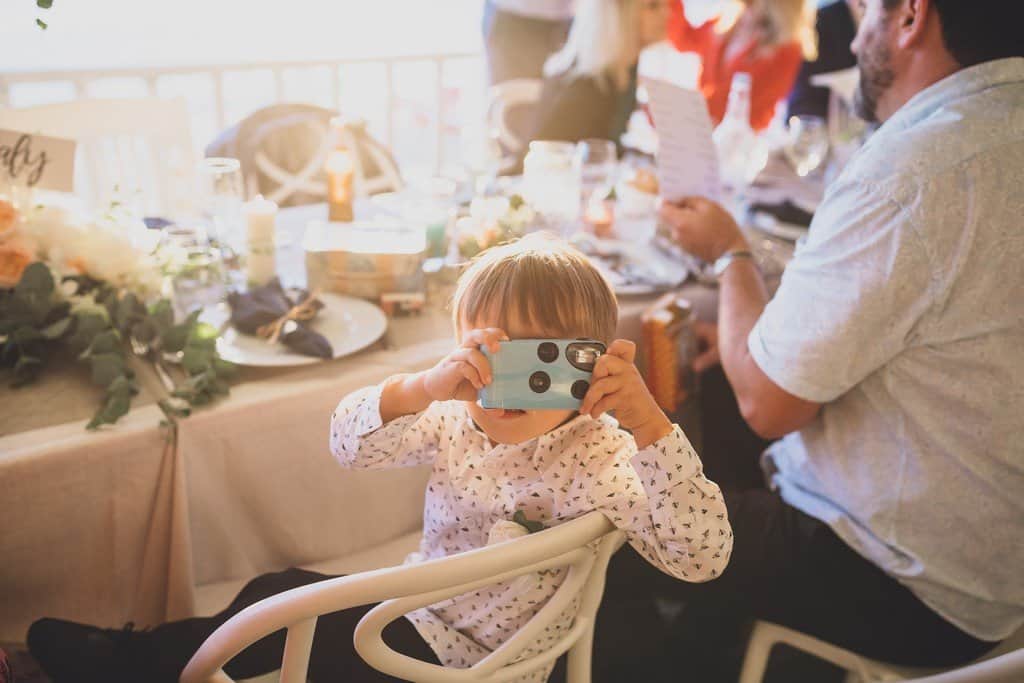 italy wedding photographer bride boho and blue suit relaxed